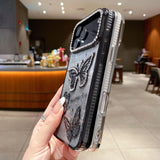 Side view of black Butterfly Sparkle iPhone 17 Case with slim fit, rhinestone camera frame, and butterfly details.