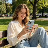 Pearl Charm Leather iPhone Case – Embossed Floral Design & Elegant Wrist Strap