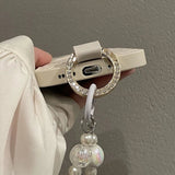 Pearl Charm Leather iPhone Case – Embossed Floral Design & Elegant Wrist Strap